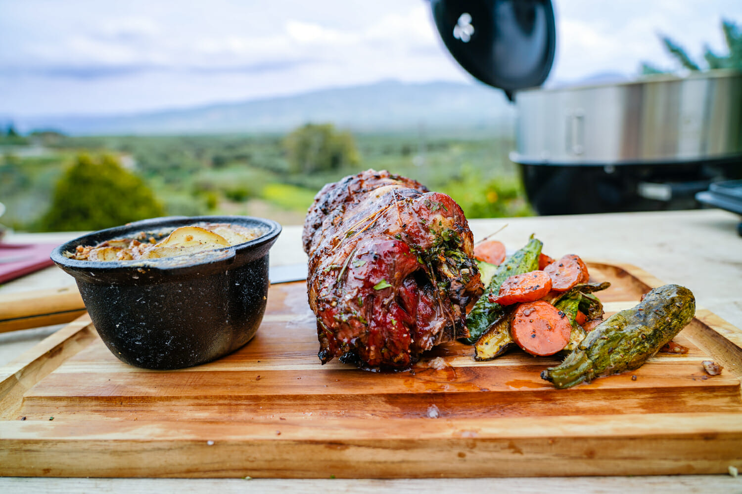 Rosemary-stuffed lamb, roasted on the barbecue and glazed with honey